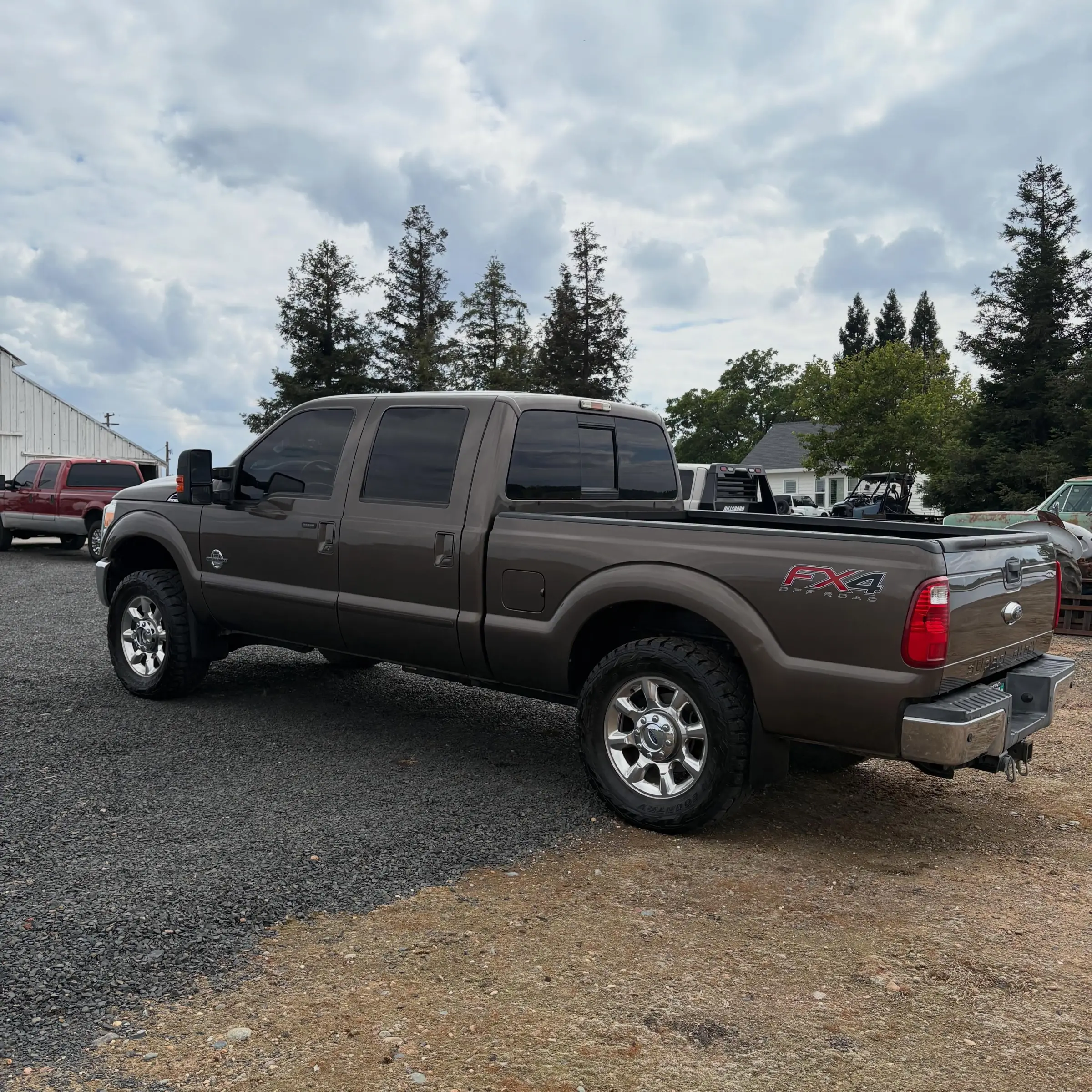 Brown Ford F-250 parked by the lake near Oroville after a detail