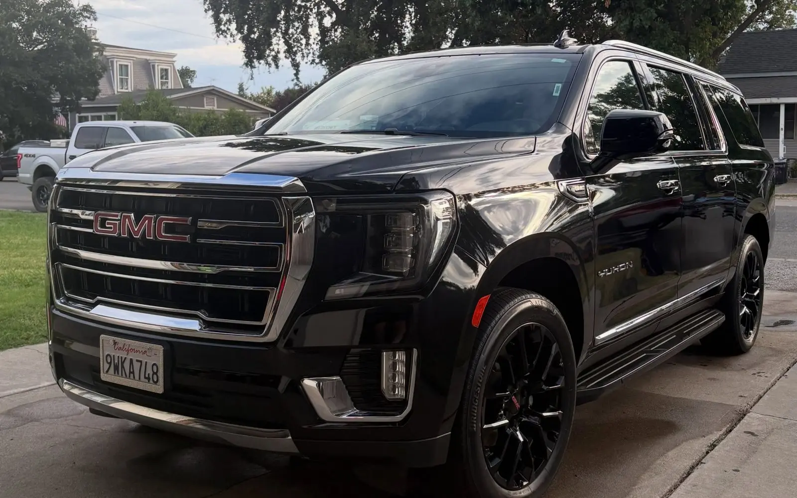 Black GMC Yukon kept clean on the Monthly Maintenance plan