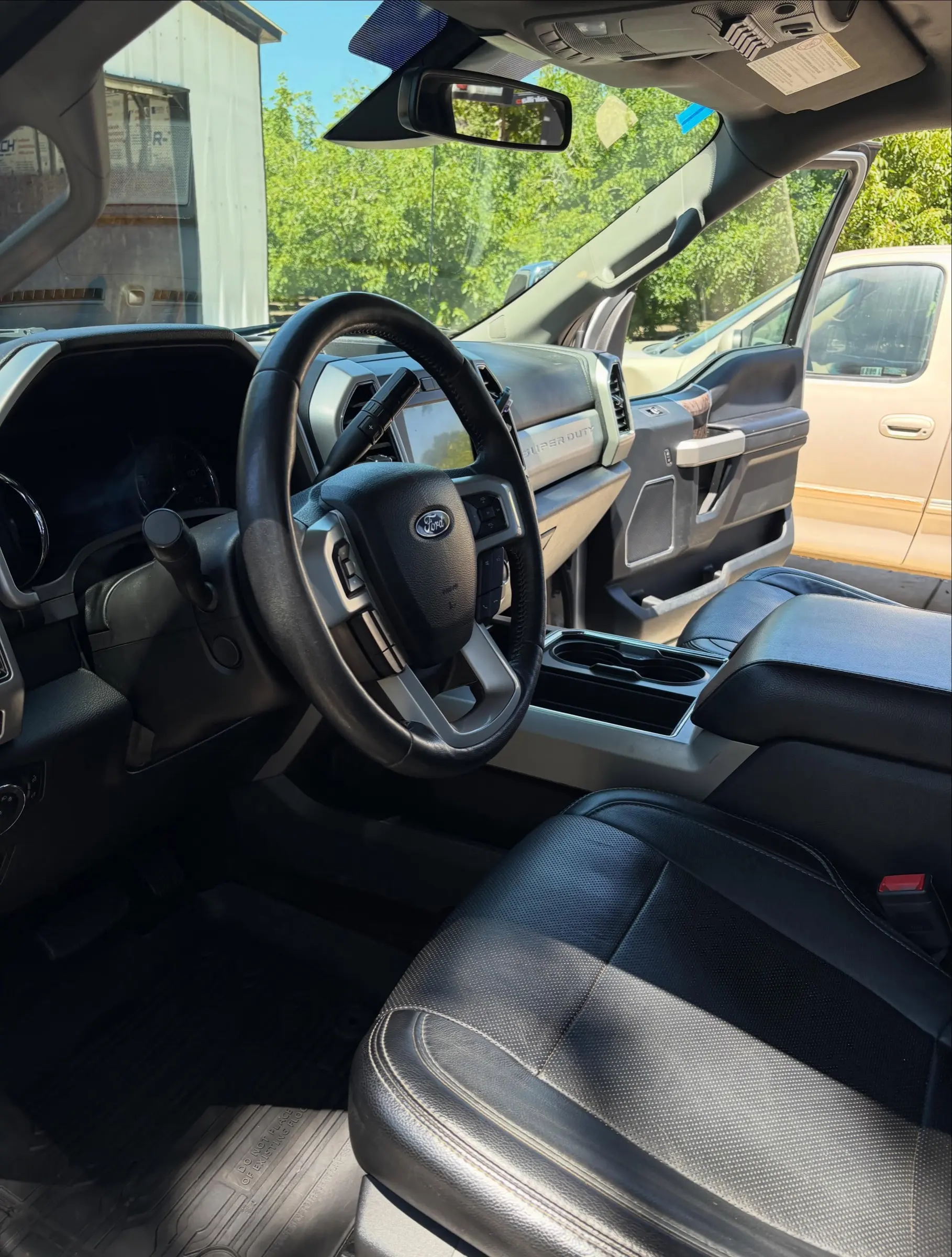 Ford F-150 driver seat and dash after a Full Detail