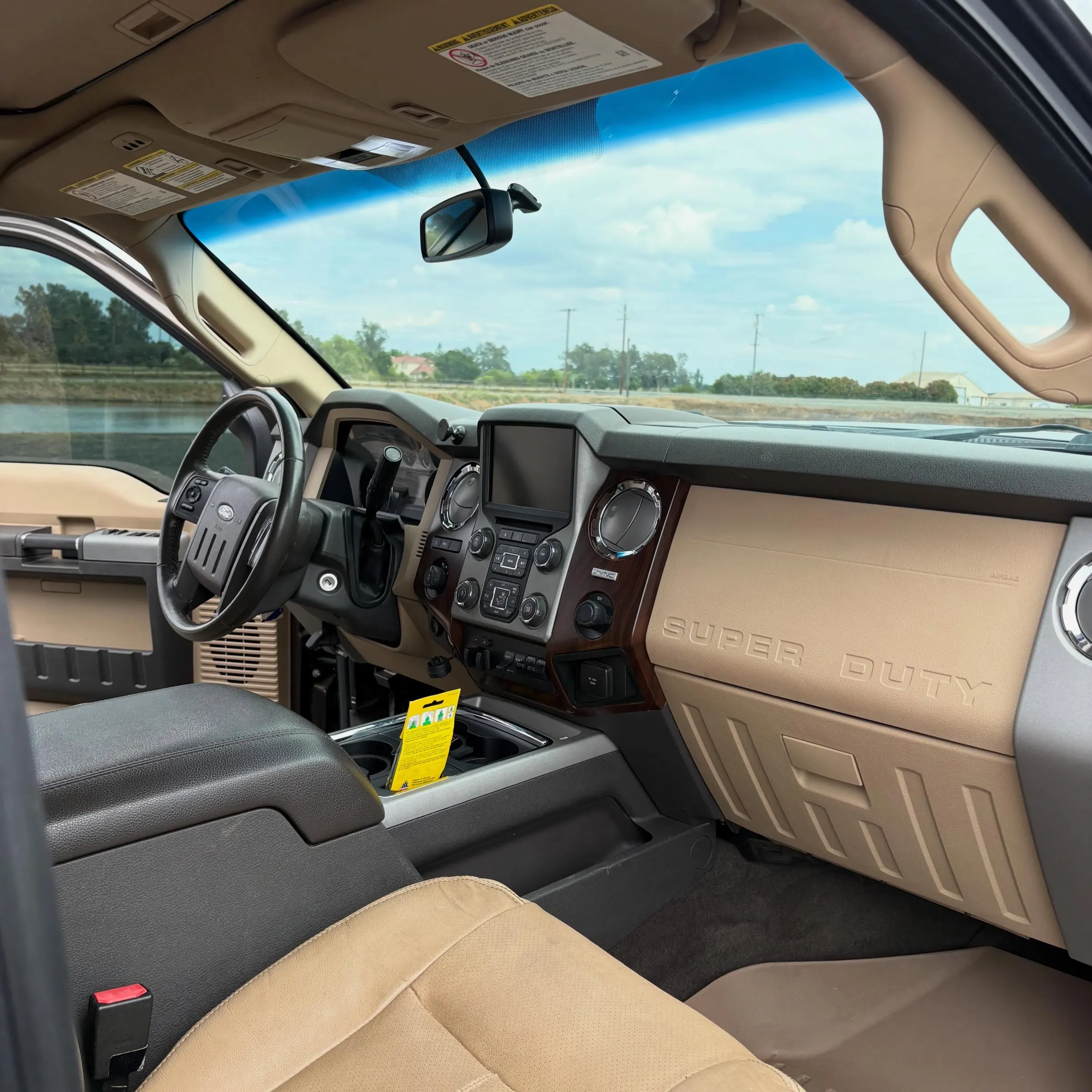 Tan leather interior of a Ford F-250 after conditioning