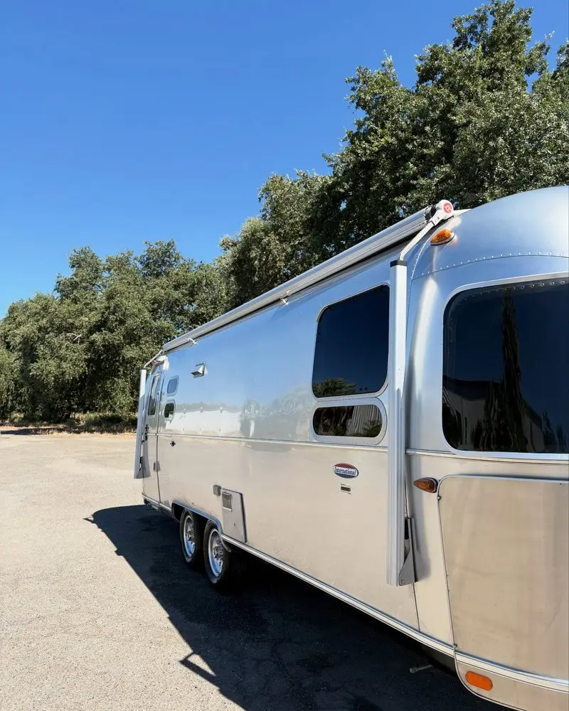 Polished Airstream trailer, side view