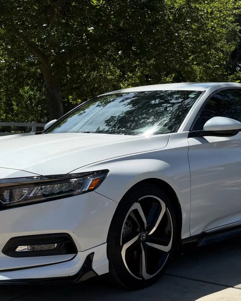 White Honda Accord rear quarter after an exterior detail