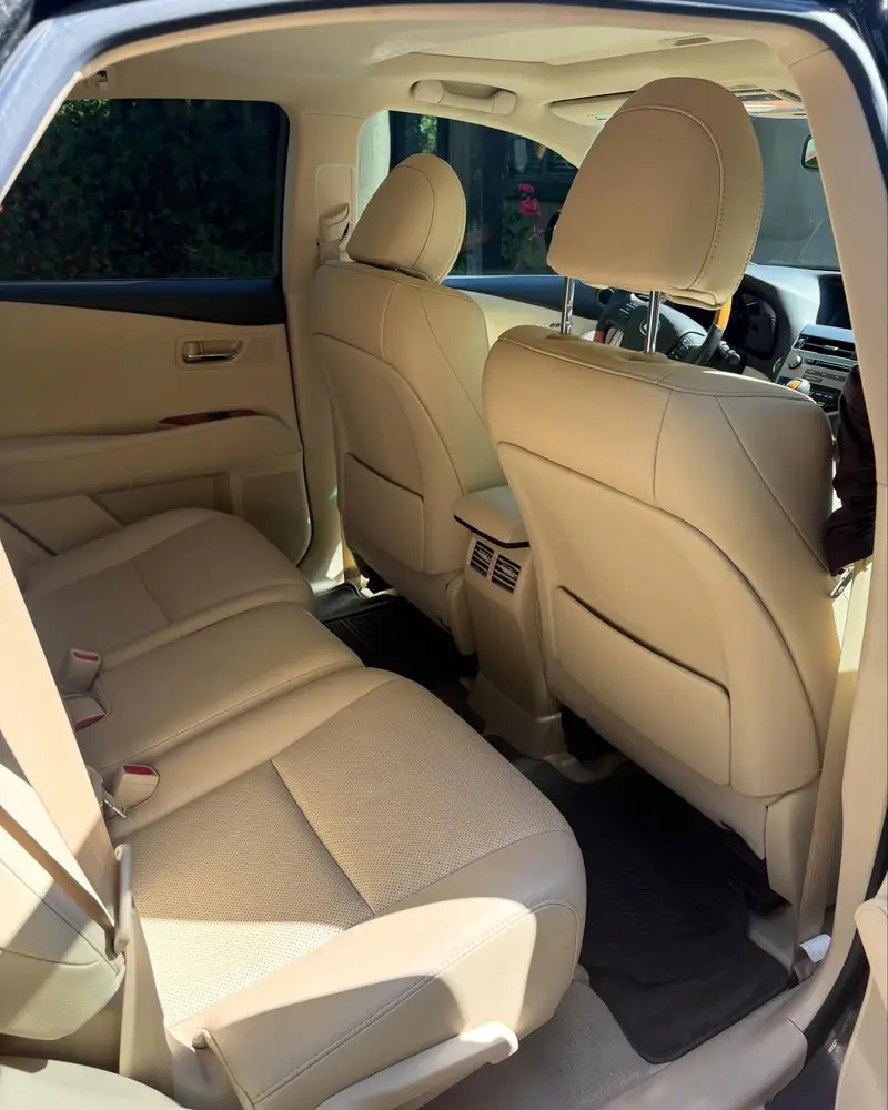 Tan leather Lexus rear seats after conditioning